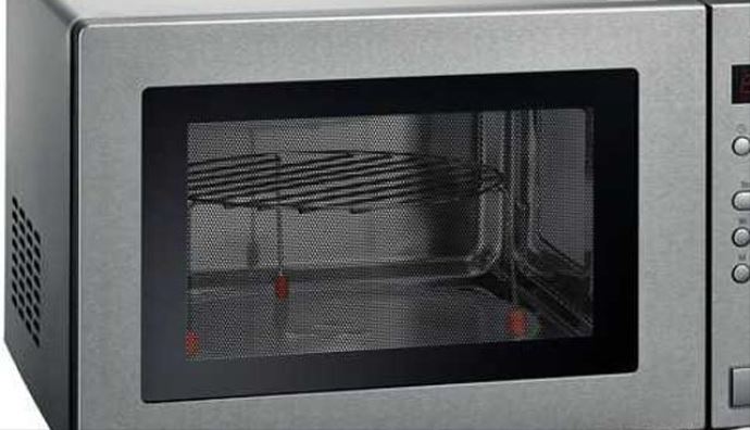 Eskiciye satılan mikrodalgadan cephanelik çıktı Eskiciye satılan mikrodalgadan cephanelik çıktı