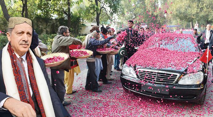 Başbakana sevgi seli, Pakistan&#039;da yoluna gül döktüler