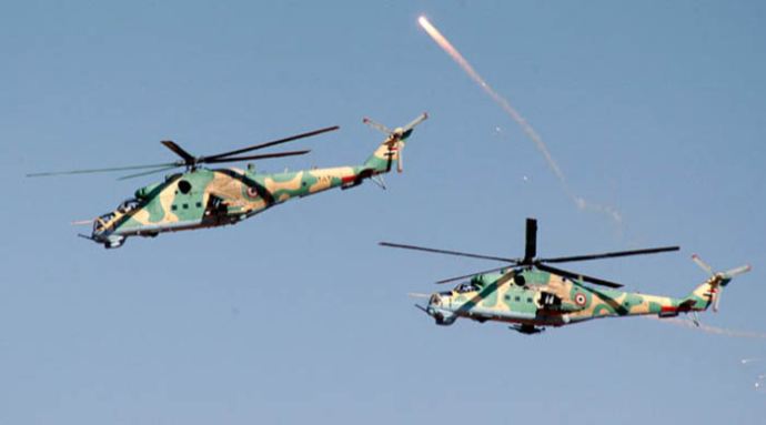 Suriye ordusu helikopterleri bomba yağdırdı Suriye ordusu helikopterleri bomba yağdırdı