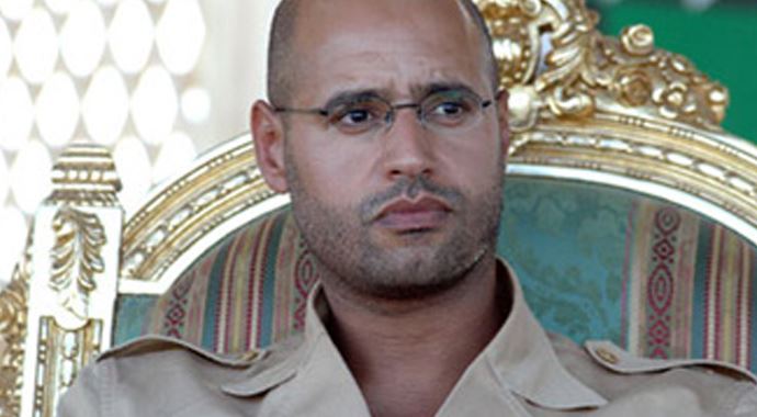 Oğul Kaddafi kafeste yargılandı Oğul Kaddafi kafeste yargılandı