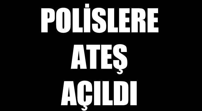 Başbakan Erdoğan'ın geçiş güzergahını bekleyen polislere ateş Başbakan Erdoğan'ın geçiş güzergahını bekleyen polislere ateş