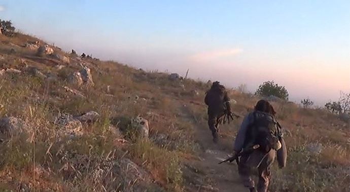 Uygur Türkleri Suriye'de Esad'e karşı savaşıyor Uygur Türkleri Suriye'de Esad'e karşı savaşıyor