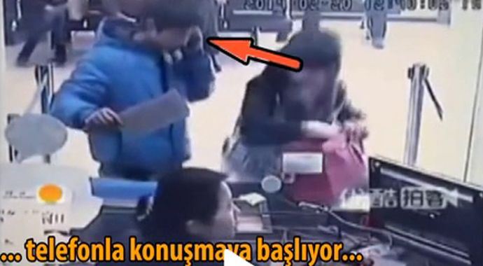 Banka memurunu bile güldüren soyguncu Banka memurunu bile güldüren soyguncu