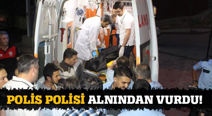 Polis, meslektaşını alnından vurdu