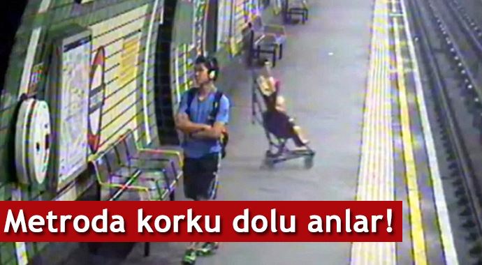 Metro raylarına düşen bebek son anda kurtarıldı Metro raylarına düşen bebek son anda kurtarıldı
