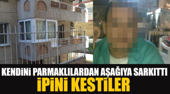 Kendini balkon demirlerinde aşağıya sarkıtan adamın ipini kestiler Kendini balkon demirlerinde aşağıya sarkıtan adamın ipini kestiler