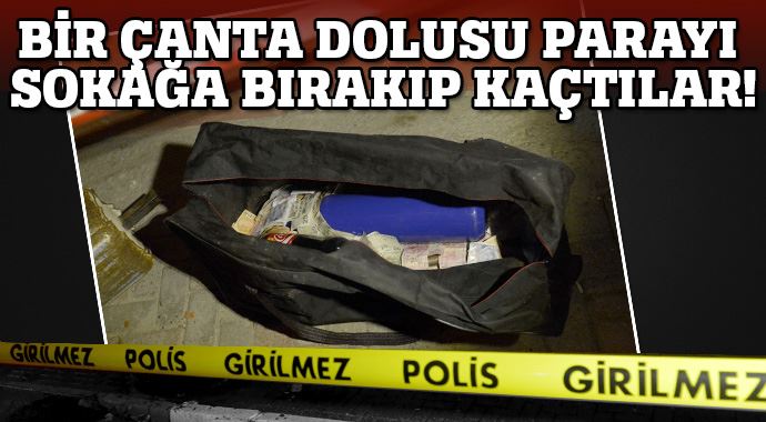 Bir çanta dolusu parayı sokağa bırakıp kaçtılar Bir çanta dolusu parayı sokağa bırakıp kaçtılar
