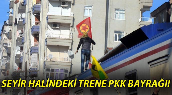 Diyarbakır'da seyir halindeki trene PKK bayrağı astılar Diyarbakır'da seyir halindeki trene PKK bayrağı astılar