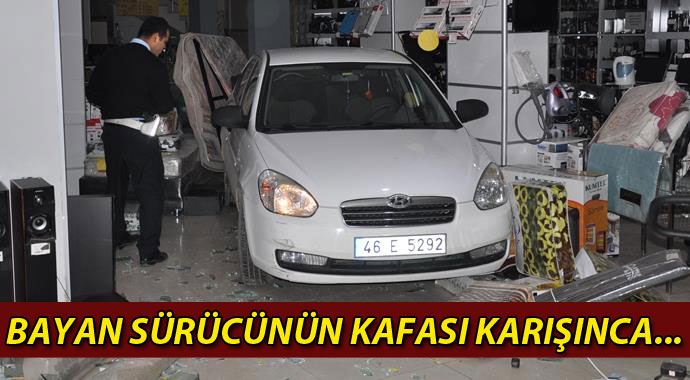 Bayan sürücü vitesleri karıştırdı, otomobil işyerine girdi