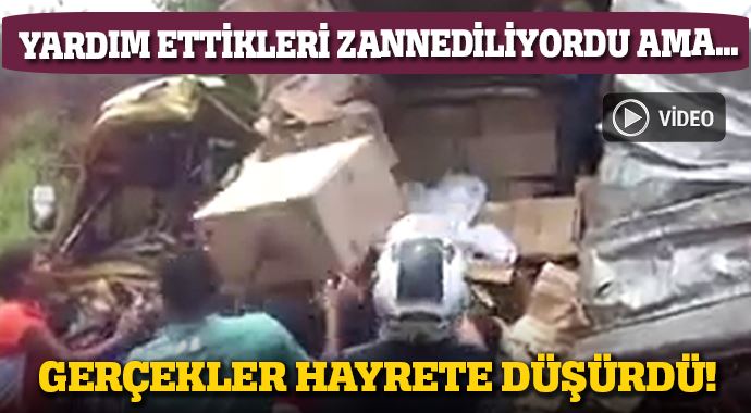 Kaza yapan kamyonu yağmaladılar
