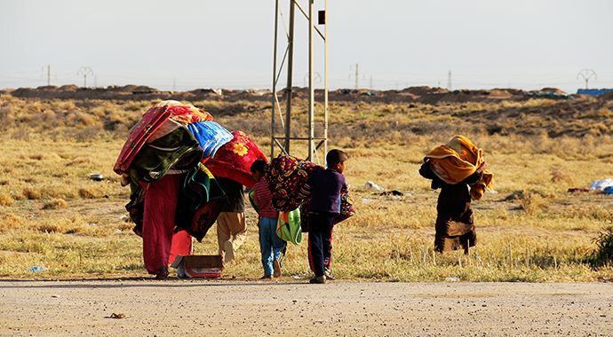 İki ateş arasında kalmak istemeyen halk, Kerkük'e sığınıyor İki ateş arasında kalmak istemeyen halk, Kerkük'e sığınıyor