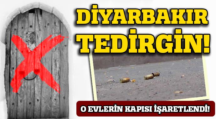 Diyarbakır'da evlerin kapısına çarpı işareti atılarak, mermi konuldu Diyarbakır'da evlerin kapısına çarpı işareti atılarak, mermi konuldu