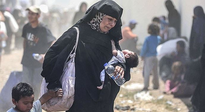 15 günde 20 bin 997 Suriyeli Türkiye'ye alındı 15 günde 20 bin 997 Suriyeli Türkiye'ye alındı