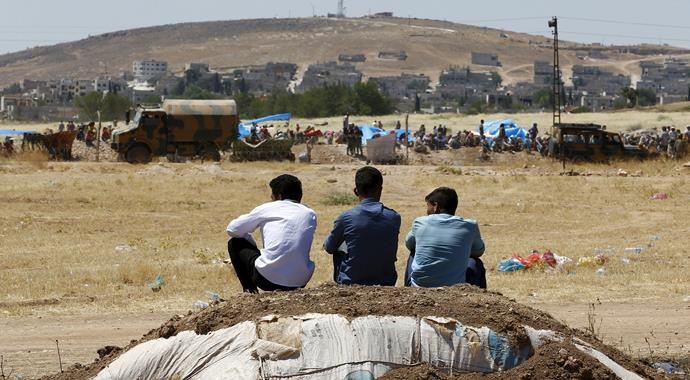 Kobani'deki saldırıda ölenlerin çocukları Urfa'ya getirildi Kobani'deki saldırıda ölenlerin çocukları Urfa'ya getirildi