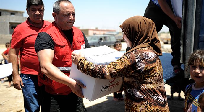 Türk Kızılayı'ndan Türkmen sığınmacılara yardım Türk Kızılayı'ndan Türkmen sığınmacılara yardım