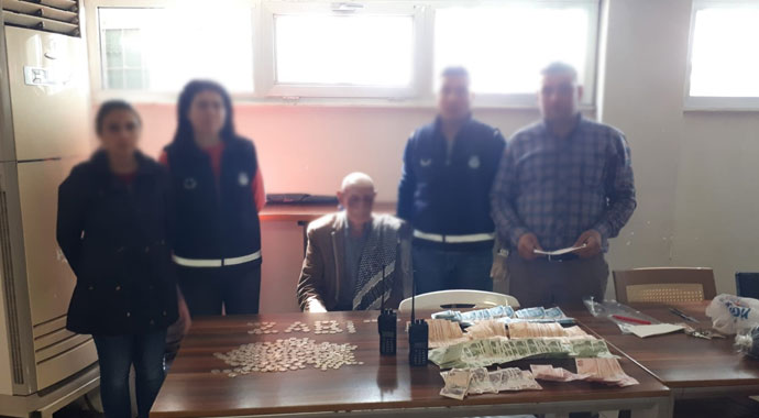 Dilencinin üzerinden çıkan para dudak uçuklattı