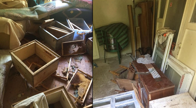 Pencereden eve giren ayı eşyaları parçaladı