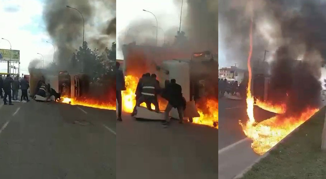 Canlarını hiçe sayıp baba ve oğlunu alev alev yanan kalan tırdan kurtardılar