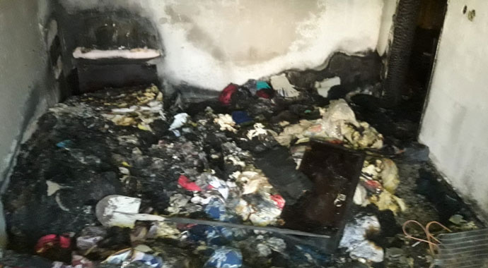 Evi yanan 15 kişilik aile yardım bekliyor