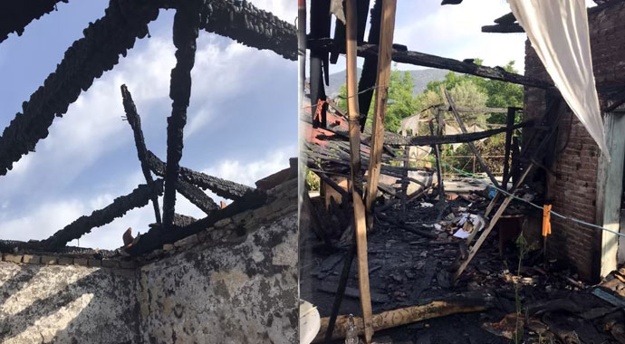 Yemek yerken komşuları evin yandığını haber verdi, çift kurtuldu