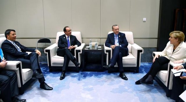 Erdoğan, liderlerle dörtlü zirvede bir araya geldi Erdoğan, liderlerle dörtlü zirvede bir araya geldi