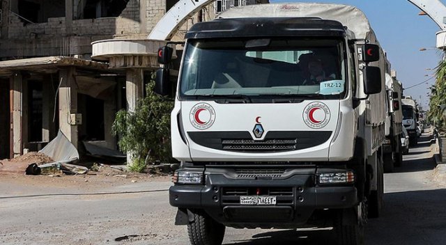 Esad, Halep'e giden yardım TIR'larını vurdu: 20 ölü Esad, Halep'e giden yardım TIR'larını vurdu: 20 ölü