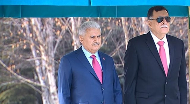 Libyalı konuğunu resmi törenle karşıladı Libyalı konuğunu resmi törenle karşıladı