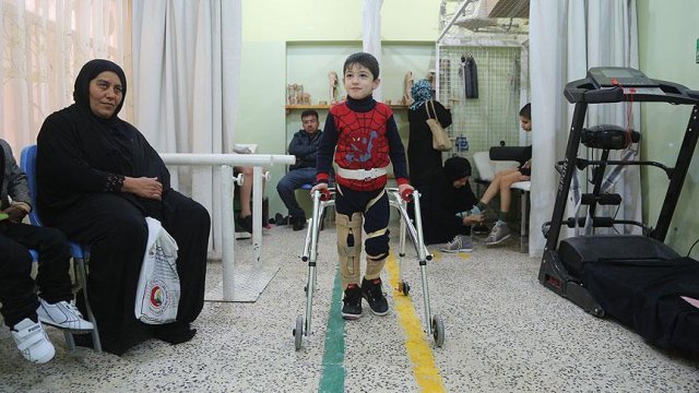 Iraklı savaş mağdurları protez uzuvlarla yeniden hayata tutunuyor Iraklı savaş mağdurları protez uzuvlarla yeniden hayata tutunuyor