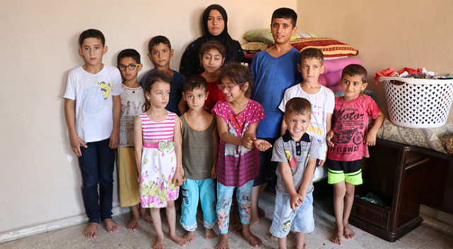 Savaştan kaçan Şeyme, 16 çocukla tek odalı evde kalıyor Savaştan kaçan Şeyme, 16 çocukla tek odalı evde kalıyor
