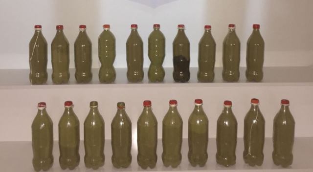 Pet şişeler içerisinde 11.5 kilo esrar ele geçirildi Pet şişeler içerisinde 11.5 kilo esrar ele geçirildi