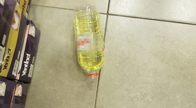İş yerine benzin dolusu şişeyi atarak kaçtılar İş yerine benzin dolusu şişeyi atarak kaçtılar