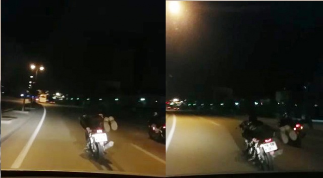 Motosikletin üzerine yatarak yarış yaptılar Motosikletin üzerine yatarak yarış yaptılar