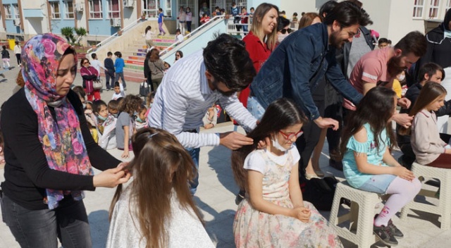 Kanser hastaları için saçlarını bağışladılar Kanser hastaları için saçlarını bağışladılar