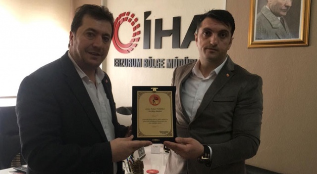 Güvenlik Korucuları ve Şehit ailelerinden İHA’ya plaket Güvenlik Korucuları ve Şehit ailelerinden İHA’ya plaket