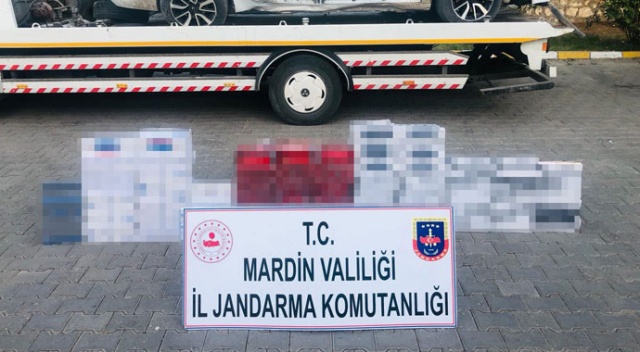 Uygulama noktasından kaçan araçtan 5 bin 700 paket kaçak sigara çıktı Uygulama noktasından kaçan araçtan 5 bin 700 paket kaçak sigara çıktı