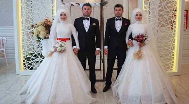 Bu düğünde gelinler de damatlar da ikiz