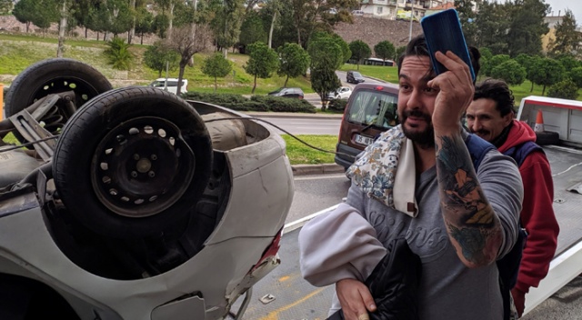 Ehliyetsiz sürücü takla attı, aracını bırakıp kaybolan telefonunu aradı!