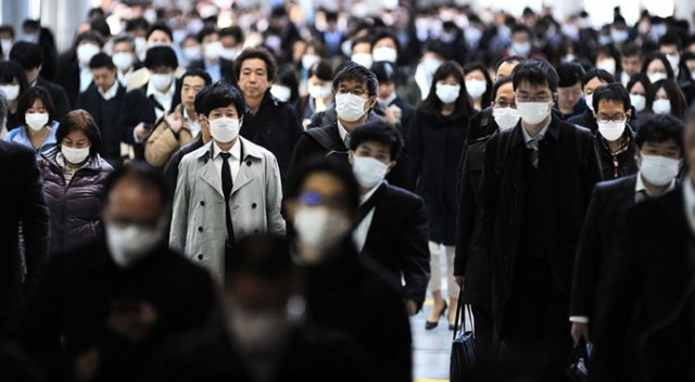 Japonya'dan kritik koronavirüs uyarısı: Gençler için de risk oluşturuyor