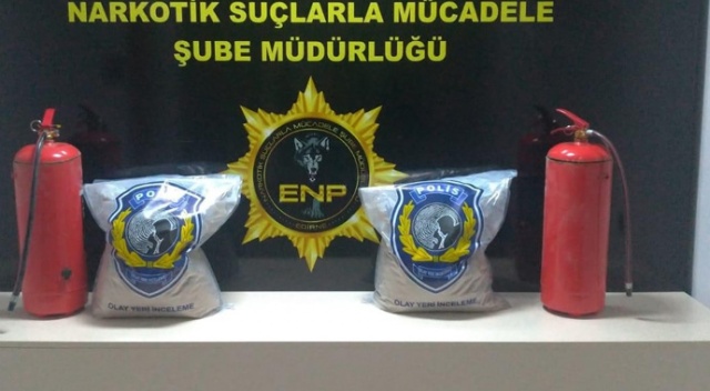 Yangın söndürme tüplerinden 20 kg eroin çıktı Yangın söndürme tüplerinden 20 kg eroin çıktı