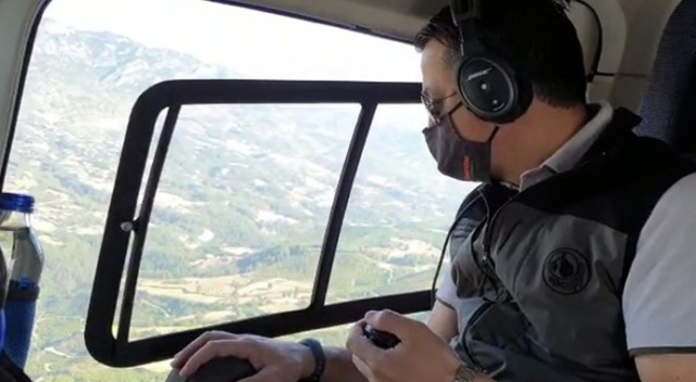 Bakan Pakdemirli, sabah saatlerinde helikopterle yangın bölgesini inceledi