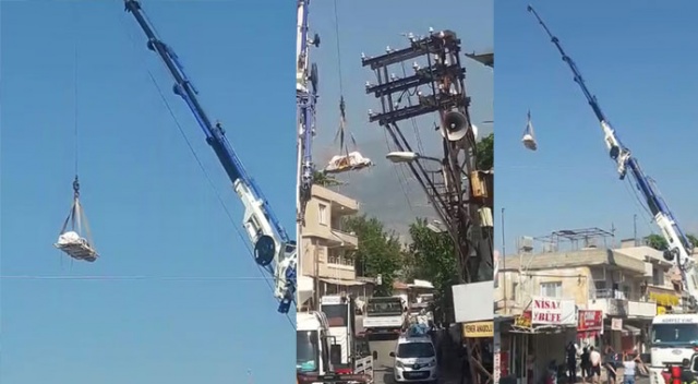 140 kiloluk cesedi vinçle taşıyabildiler