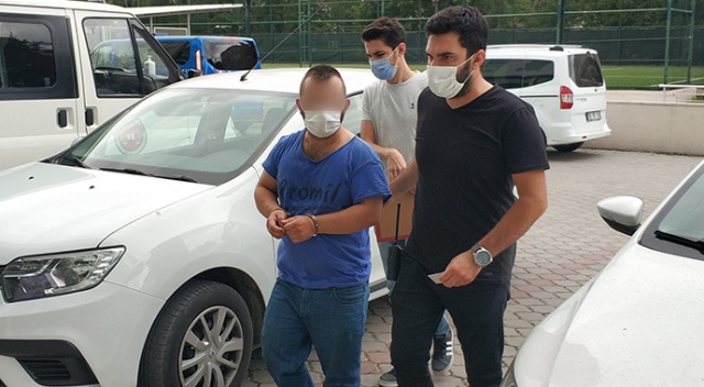 Eşini tehdit edip taşla cam kırdığı iddia edilen kocaya gözaltı