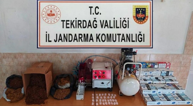 40 bin liralık makine ile sigara sararken yakalandı 40 bin liralık makine ile sigara sararken yakalandı