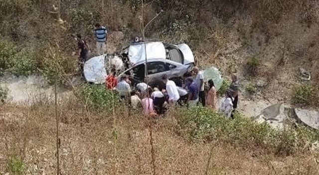 Otomobille şarampole yuvarlanan çifti ölüm ayırdı Otomobille şarampole yuvarlanan çifti ölüm ayırdı