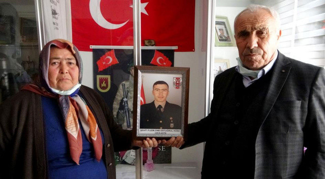 Ev küle dönerken şehidin hatıraları zarar görmedi Ev küle dönerken şehidin hatıraları zarar görmedi