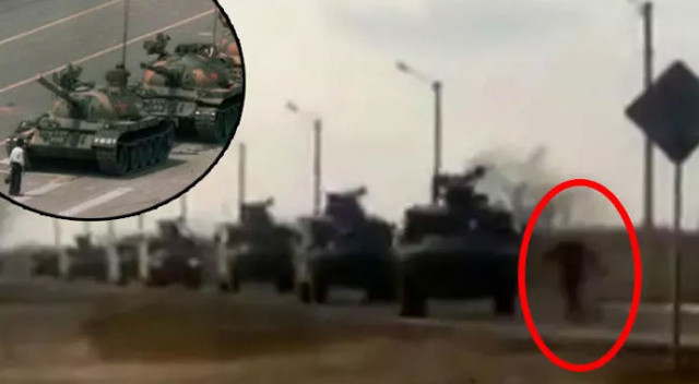 Rus tanklarının önüne tek başına geçti! Dünya bu cesur Ukraynalıyı konuşuyor Rus tanklarının önüne tek başına geçti! Dünya bu cesur Ukraynalıyı konuşuyor