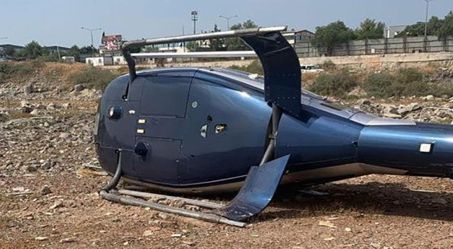 İzmir'de feci kaza! Sivil helikopter kalkış esnasında yan yattı İzmir'de feci kaza! Sivil helikopter kalkış esnasında yan yattı