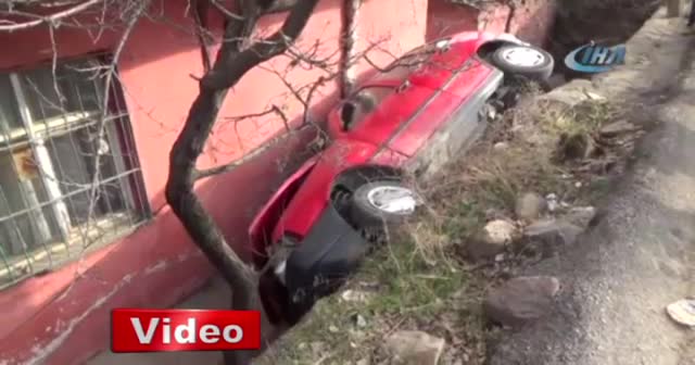 Otomobil evin bahçesine düştü: 1 yaralı