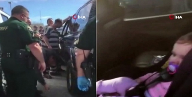 Araçta kilitli kalan bebeği mahkumlar kurtardı
