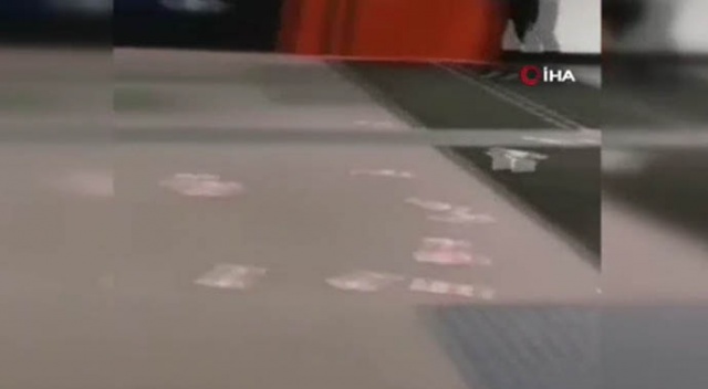 Çin'de metroda saçılan paralara "korona" korkusuyla kimse dokunamadı